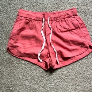 Salmon colored XS Roxy Shorts. Elastic waistband. Drawstring.